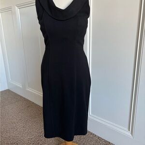 Black sleeveless dress can be casual or dressed up.